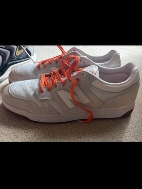 Worn once!New Balance Men's White Leather Sneakers with Bright Orange Laces